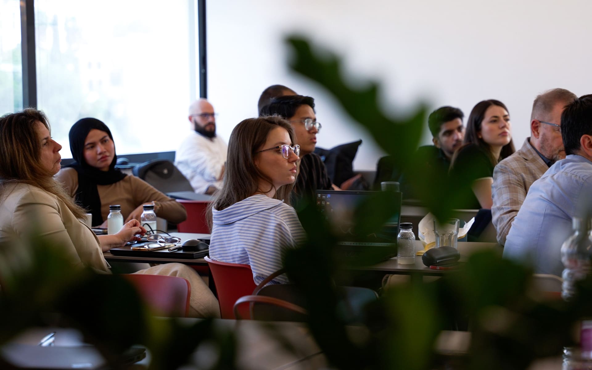 Talent acquisition specialist in a meeting discussing hiring tech talent.