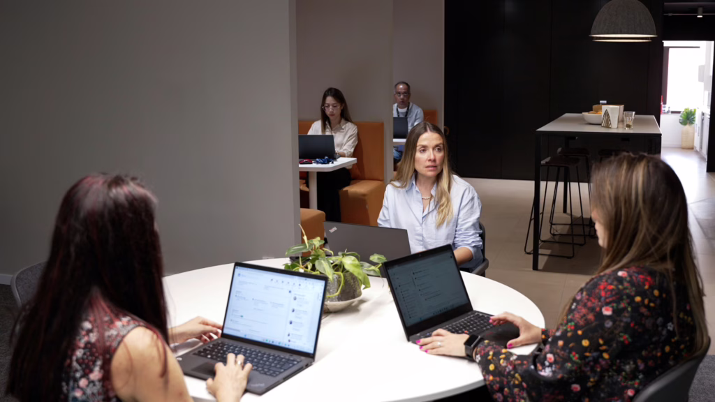 INSCALE employees working in an office