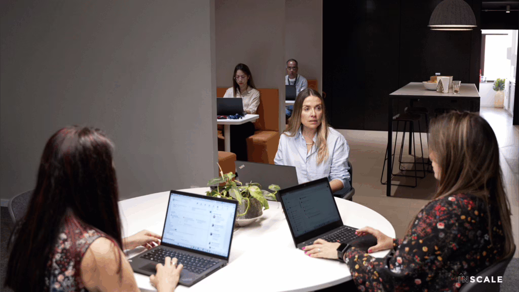 INSCALE Employees working in an office